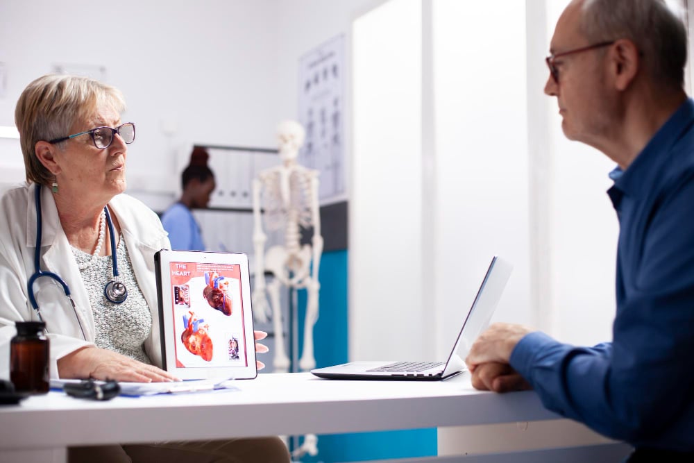 Doctor talking to company representative