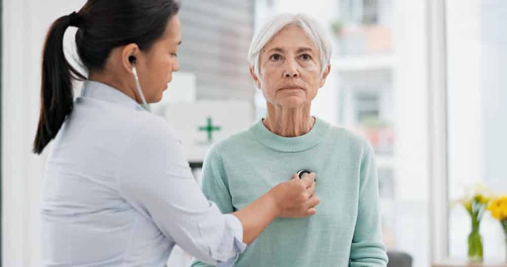 older woman getting a health exam