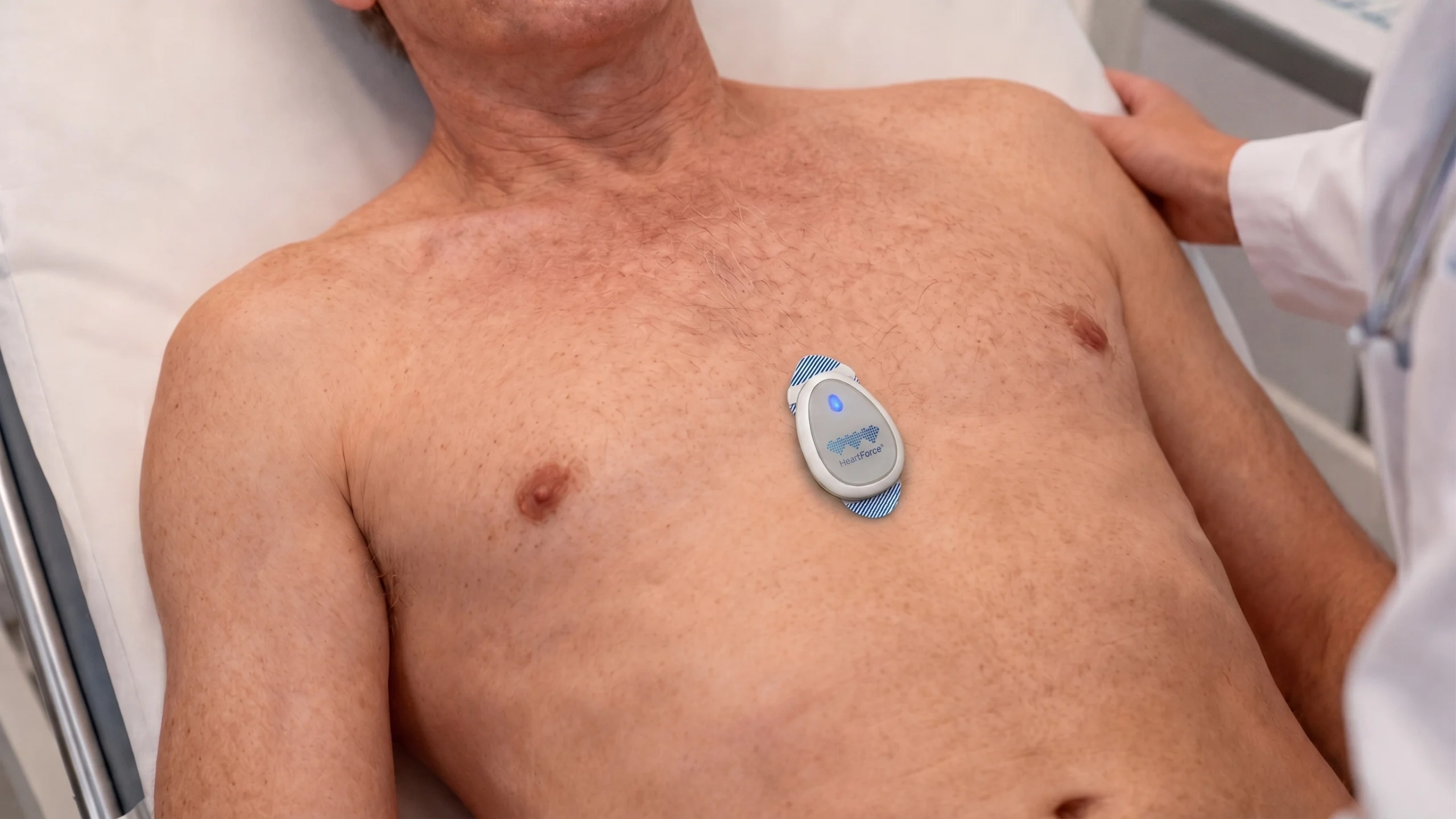man with CardioClin device on chest